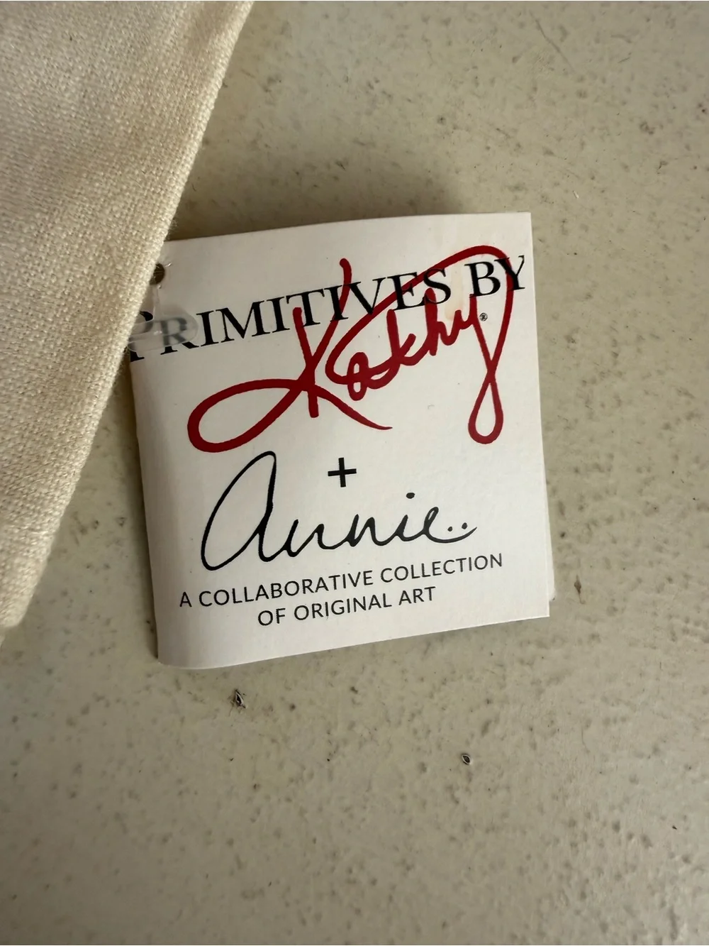 Primitives by Kathy Cream Towel with Pink Peony Design and Embroidered Script